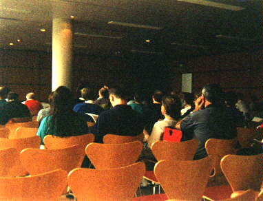 [Photo of forum]