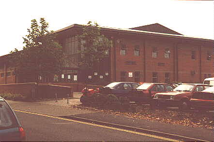 [Photo of pool & car park]